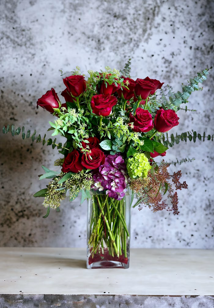 Luxurious 2 dozen red roses bouquet, ideal for grand romantic gestures, anniversaries, and special celebrations, available for same-day delivery in Los Angeles. A stunning expression of love and passion