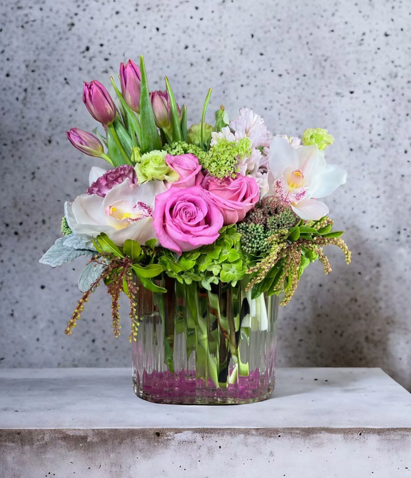 Bloom floral arrangement featuring a vibrant mix of colorful flowers, perfect for brightening any occasion, available for same-day delivery in Los Angeles for birthdays, celebrations, and anniversaries