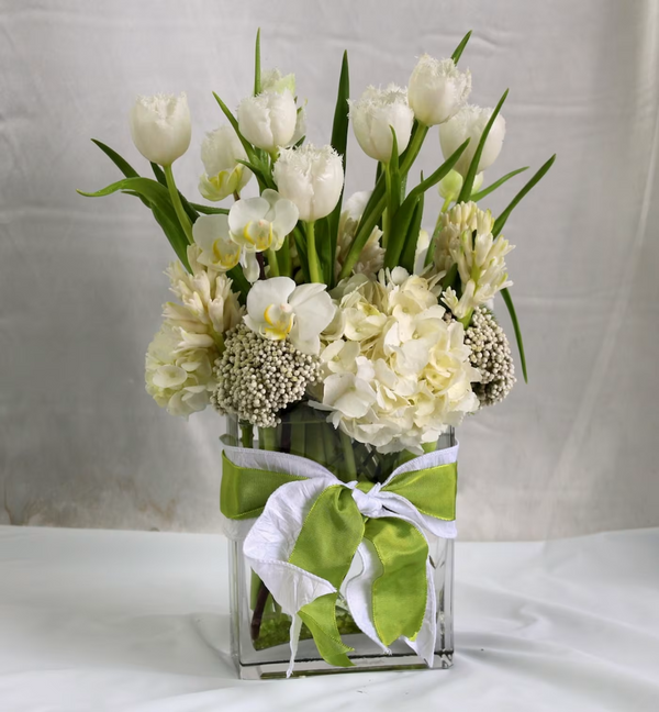 White Modern Tulips floral arrangement, featuring elegant white tulips, perfect for sophisticated events, gifts, or spring celebrations, available for same-day delivery in Los Angeles.