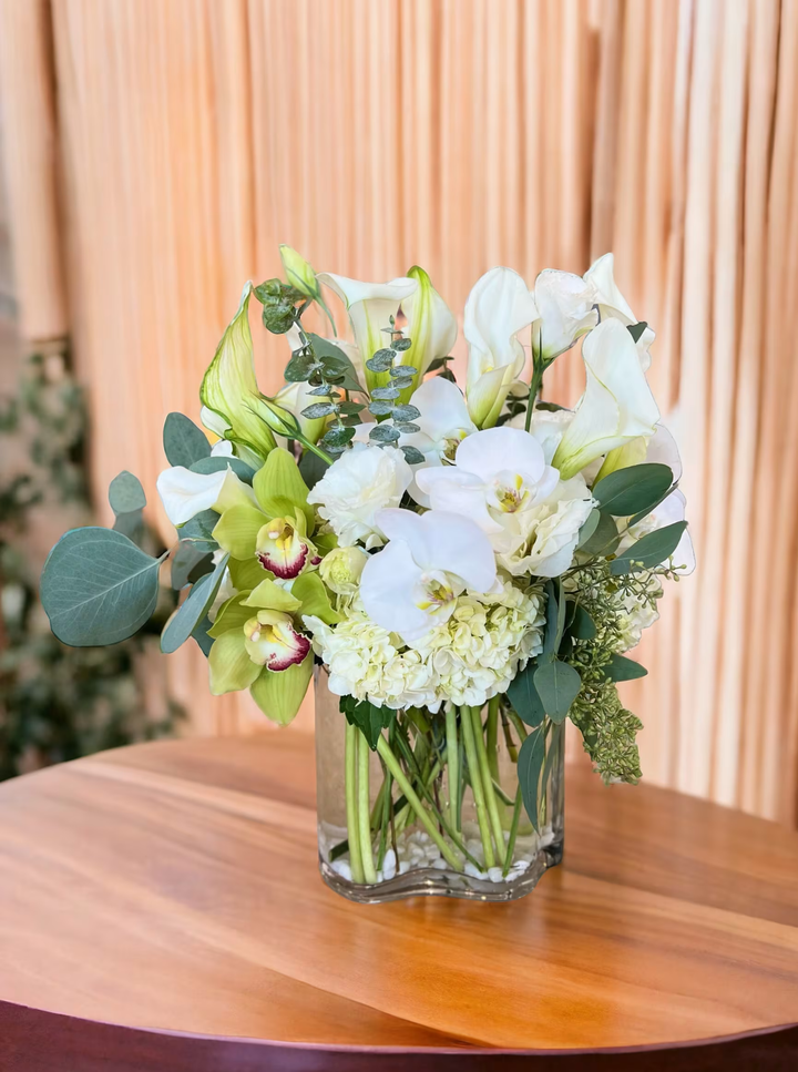 Orchids and Calla Lilies floral arrangement, featuring elegant orchids and graceful calla lilies, perfect for weddings, anniversaries, and luxurious gifts, available for same-day delivery in Los Angeles