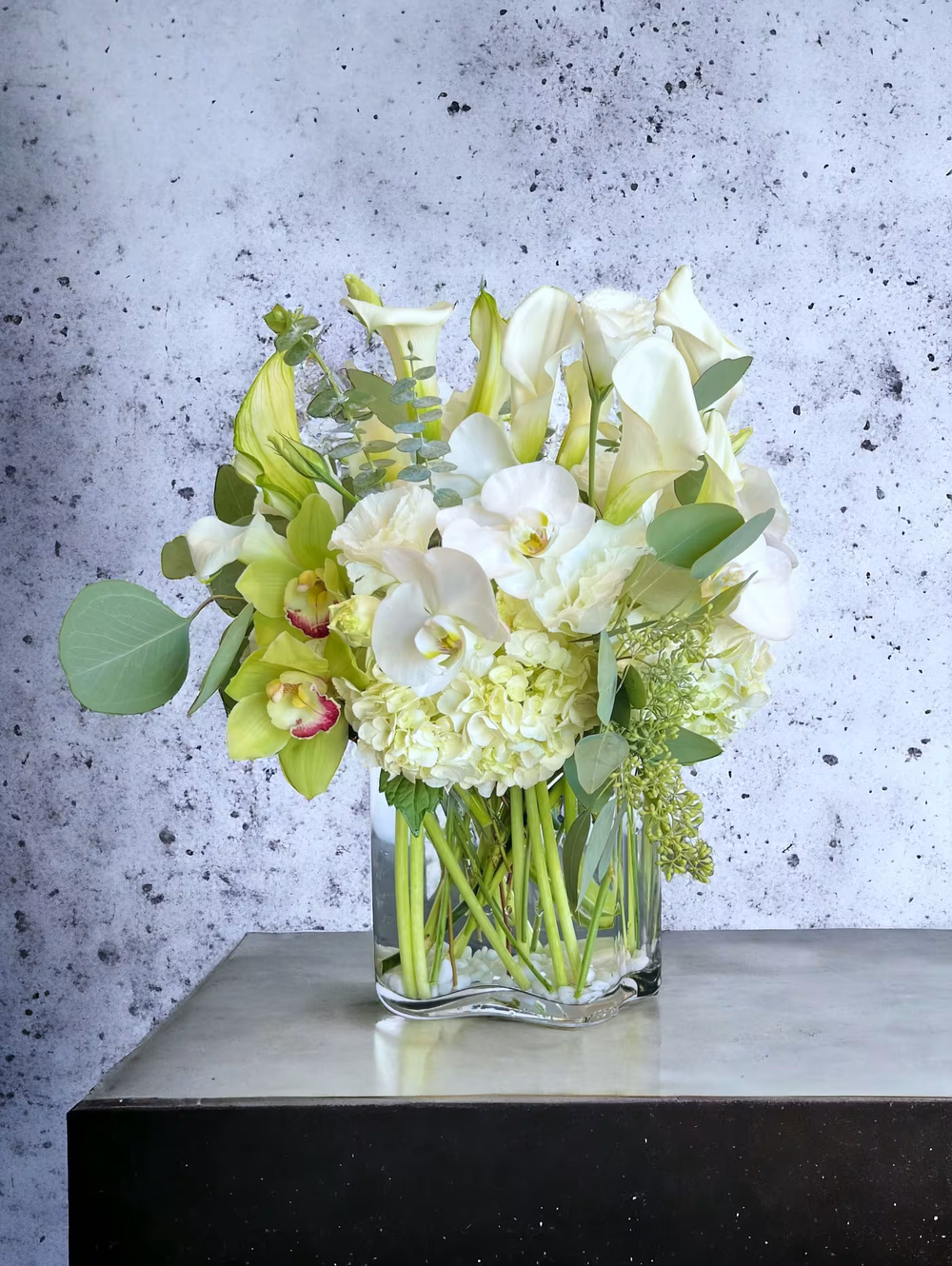 Orchids and Calla Lilies floral arrangement, featuring elegant orchids and graceful calla lilies, perfect for weddings, anniversaries, and luxurious gifts, available for same-day delivery in Los Angeles