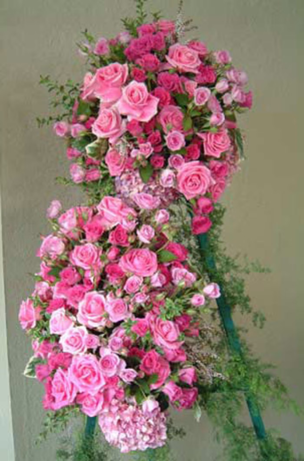 Pretty Pink Funeral Spray floral arrangement, a graceful and respectful tribute featuring soft pink blooms, ideal for memorials and funerals, available for same-day delivery in Los Angeles