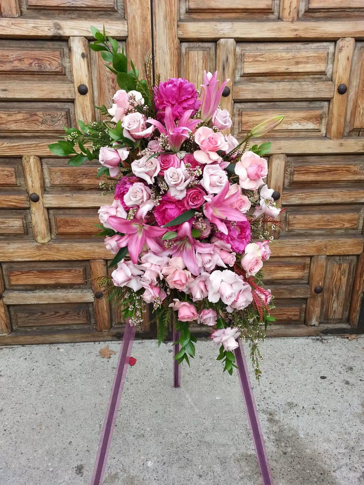 Standing Pink Funeral Wreath floral arrangement, a respectful and elegant tribute featuring pink blooms, perfect for memorials and funerals, available for same-day delivery in Los Angeles.