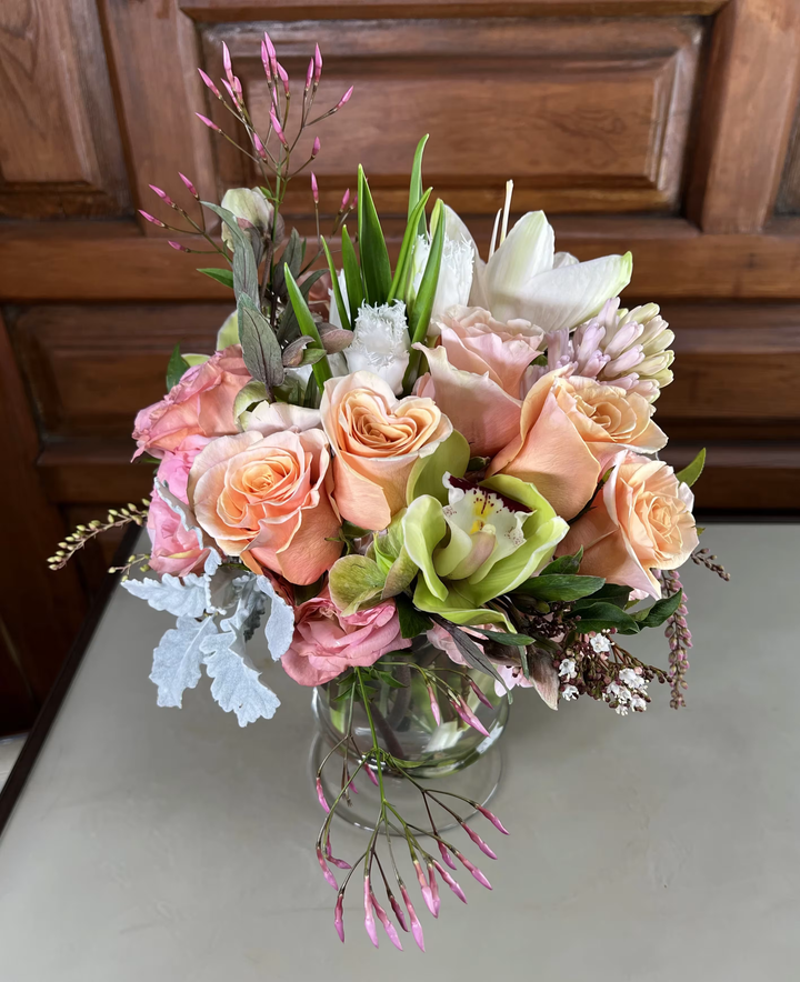 Charming peach-toned floral arrangement, perfect for adding warmth to any occasion, available for same-day delivery in West Los Angeles.