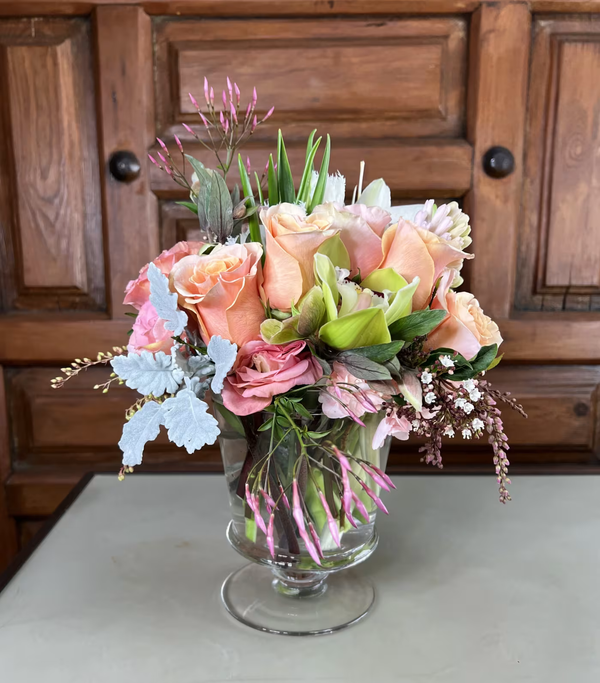 Charming peach-toned floral arrangement, perfect for adding warmth to any occasion, available for same-day delivery in West Los Angeles.